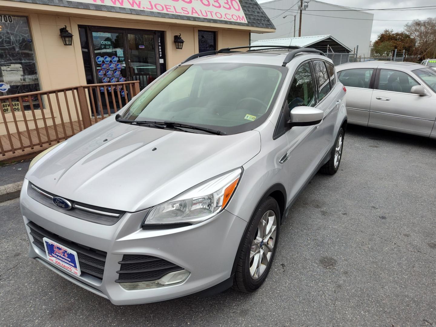 2014 Silver Ford Escape (1FMCU0GX7EU) , Automatic transmission, located at 5700 Curlew Drive, Norfolk, VA, 23502, (757) 455-6330, 36.841885, -76.209412 - Photo#5